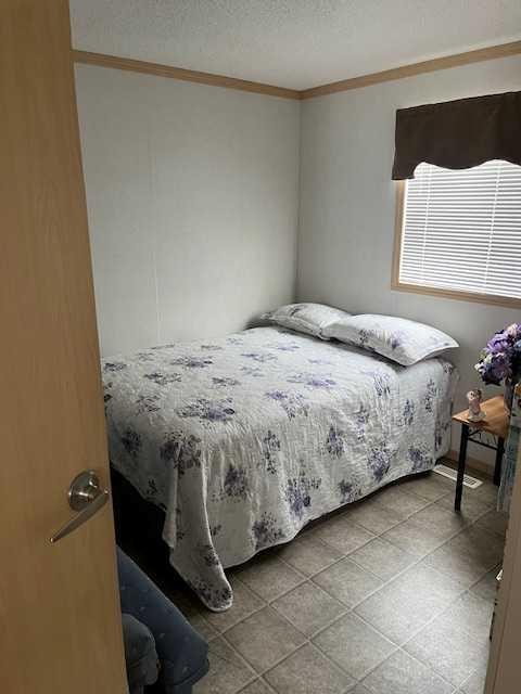 303 4Th Avenue Sw, Manning, AB - Indoor Photo Showing Bedroom