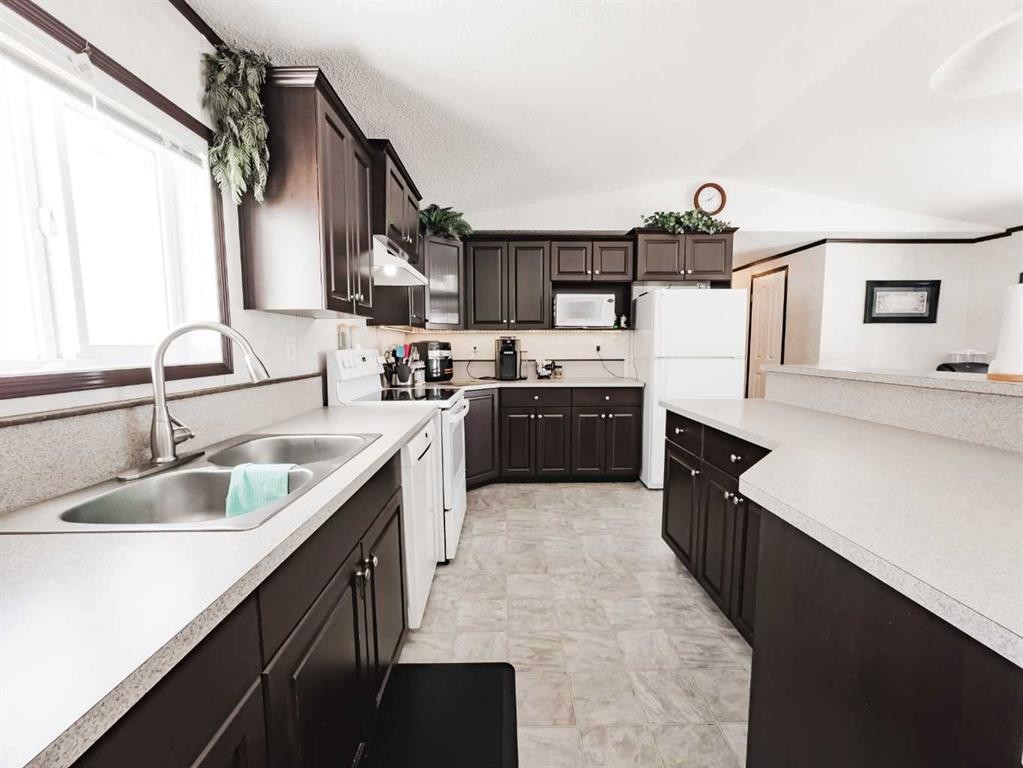893029 Range Rd 232, Manning, AB - Indoor Photo Showing Kitchen With Double Sink