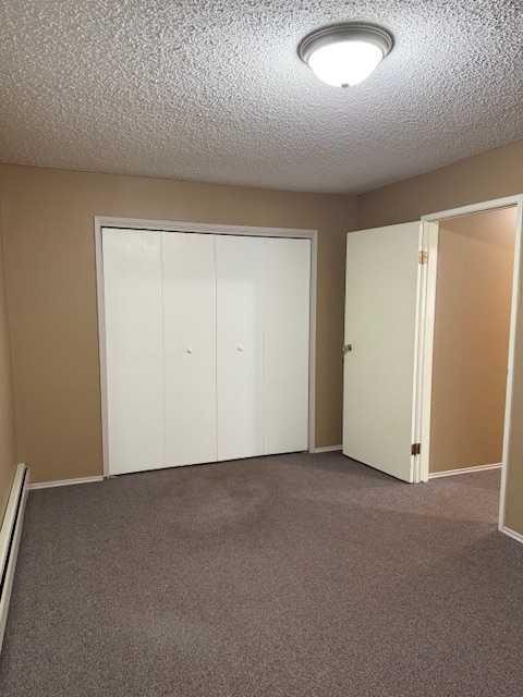 101-11114 Hoppe, Grande Cache, AB - Indoor Photo Showing Other Room