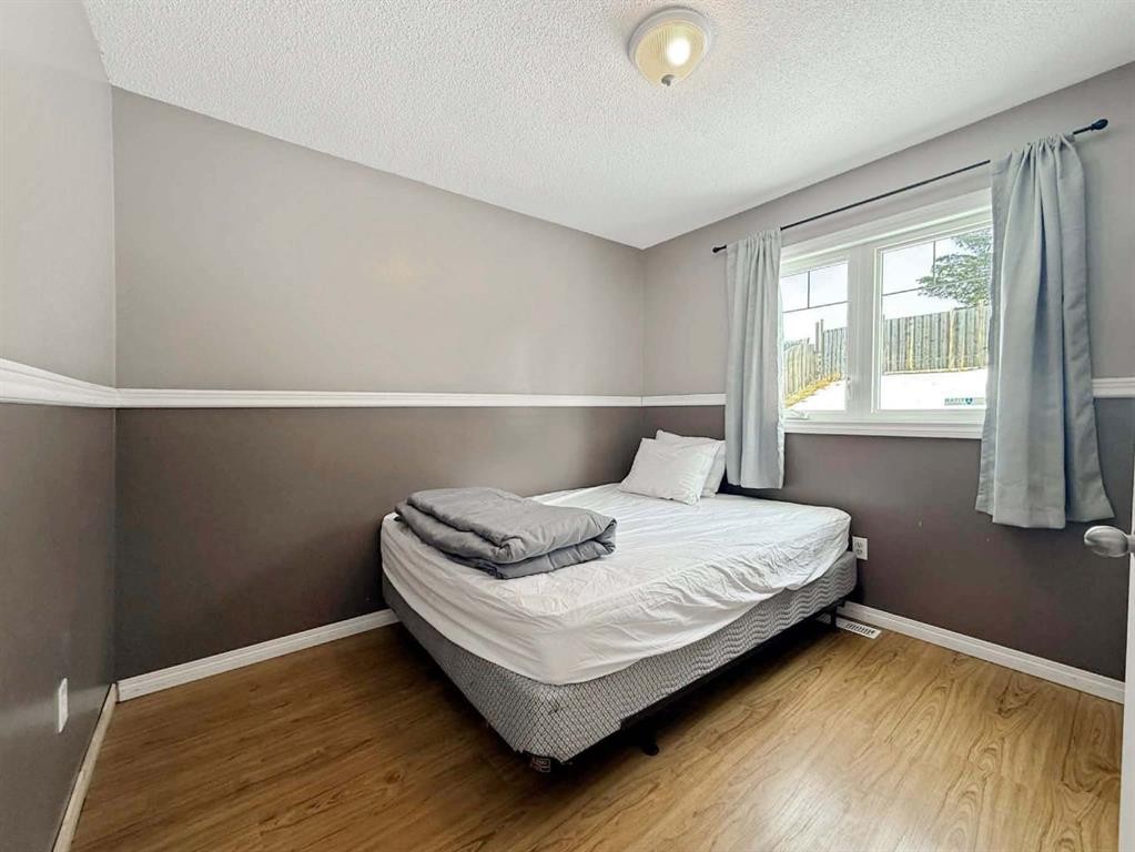 11071 Swann Drive, Grande Cache, AB - Indoor Photo Showing Bedroom