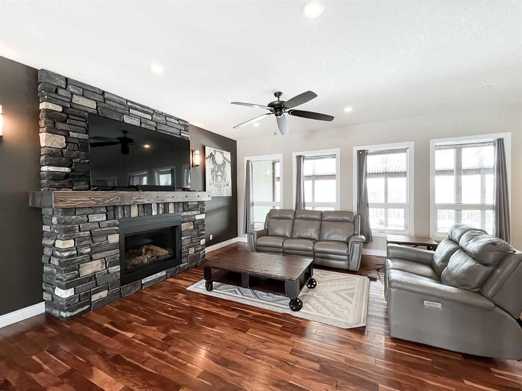 1-914033 Rr 234, Manning, AB - Indoor Photo Showing Living Room With Fireplace