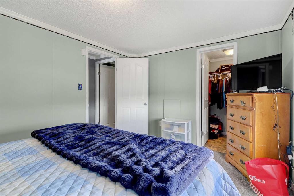 8930 89St, Grande Prairie, AB - Indoor Photo Showing Bedroom