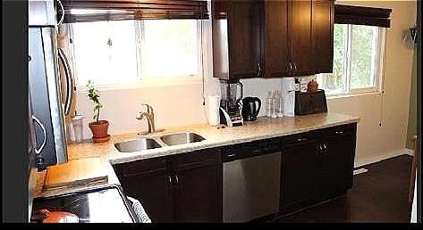 9523 89 Avenue, Peace River, AB - Indoor Photo Showing Kitchen With Double Sink