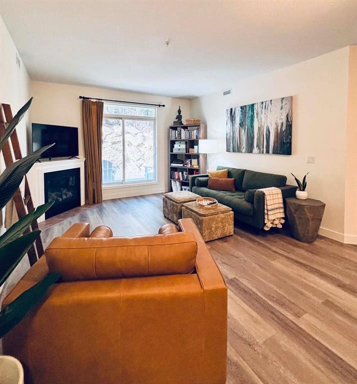 109-160 Moberly Road, Grande Cache, AB - Indoor Photo Showing Living Room With Fireplace