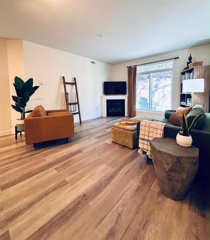 109-160 Moberly Road, Grande Cache, AB - Indoor Photo Showing Living Room With Fireplace