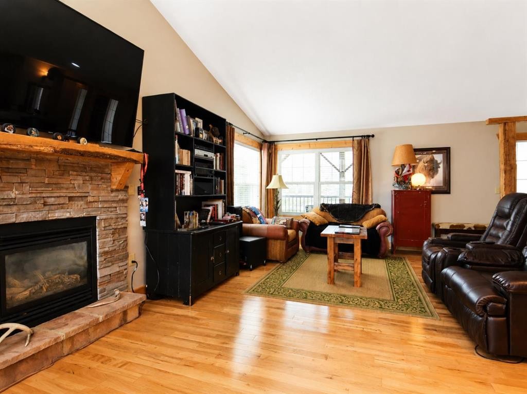 14-71332 Range Road 262, Ridgevalley, AB - Indoor Photo Showing Living Room With Fireplace