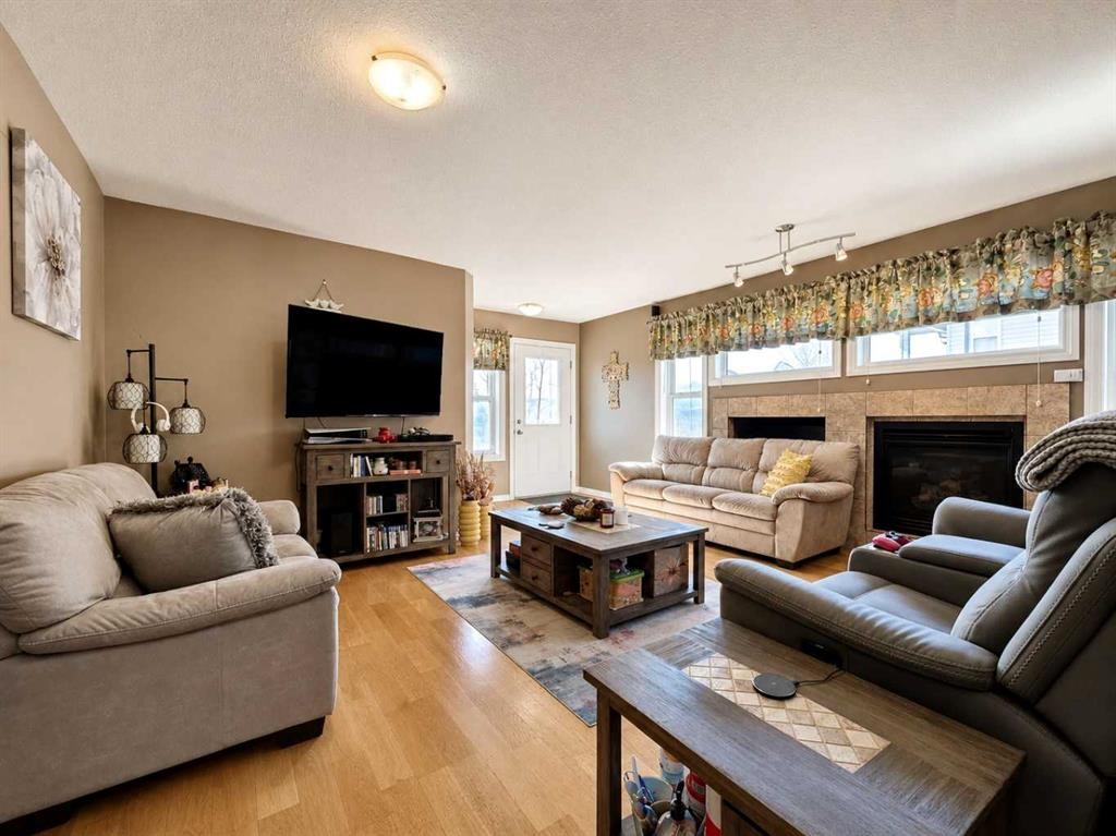 114 Moberly Road, Grande Cache, AB - Indoor Photo Showing Living Room With Fireplace