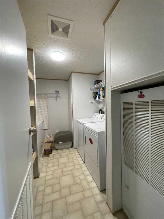 12 Dewberry Road, High Level, AB - Indoor Photo Showing Laundry Room