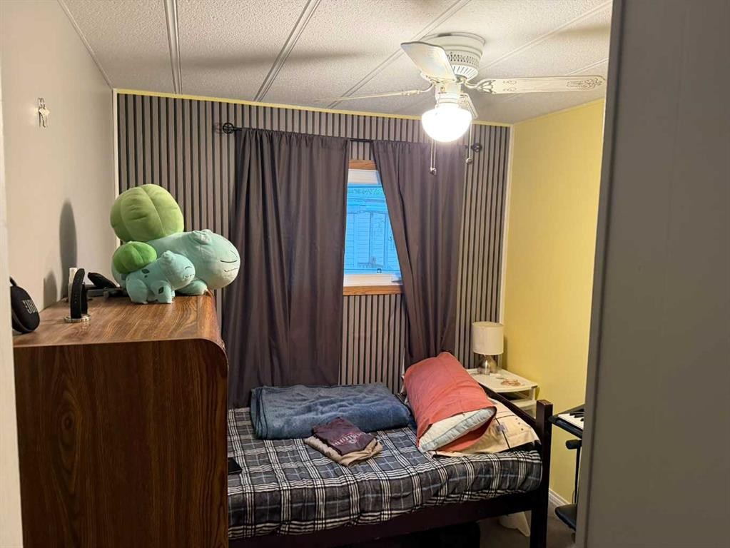 436 1 Street Sw, Falher, AB - Indoor Photo Showing Bedroom