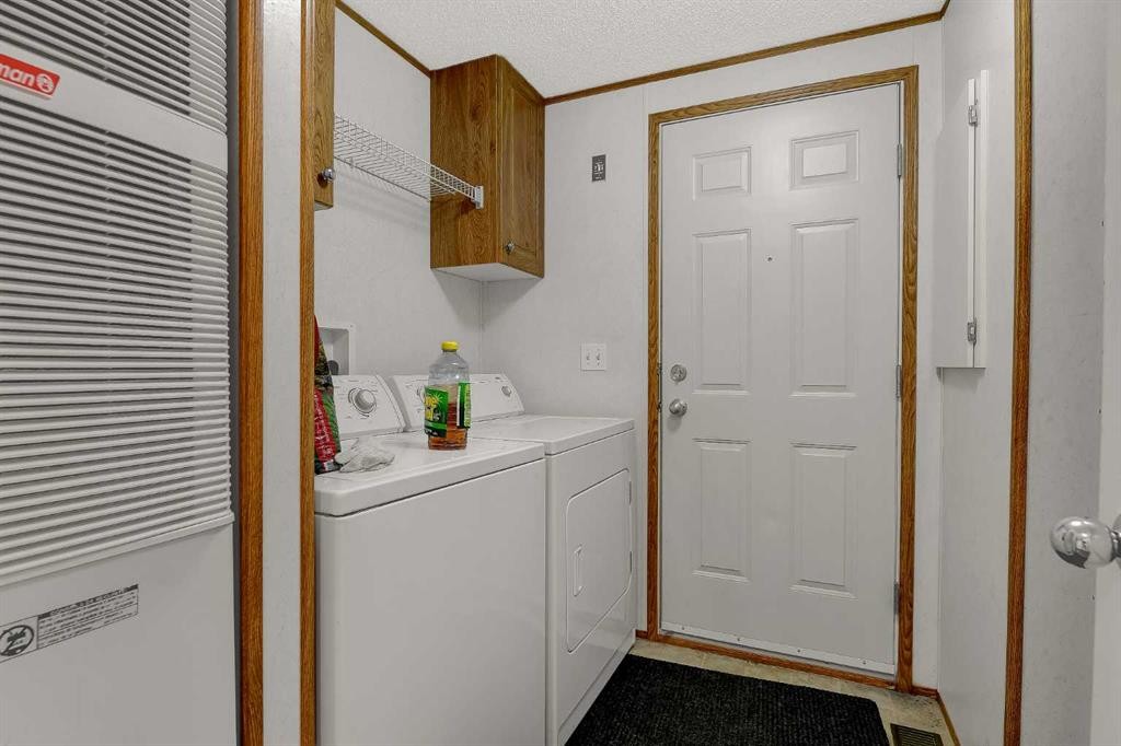 9709 110 Avenue, Clairmont, AB - Indoor Photo Showing Laundry Room
