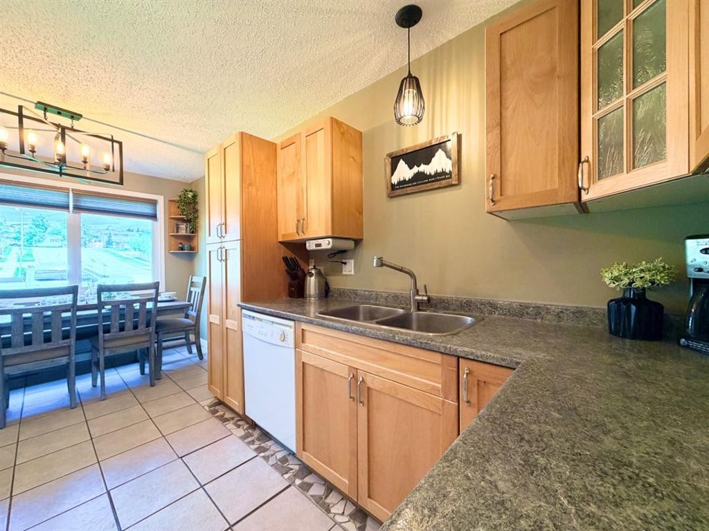 53 97 Avenue, Grande Cache, AB - Indoor Photo Showing Kitchen With Double Sink