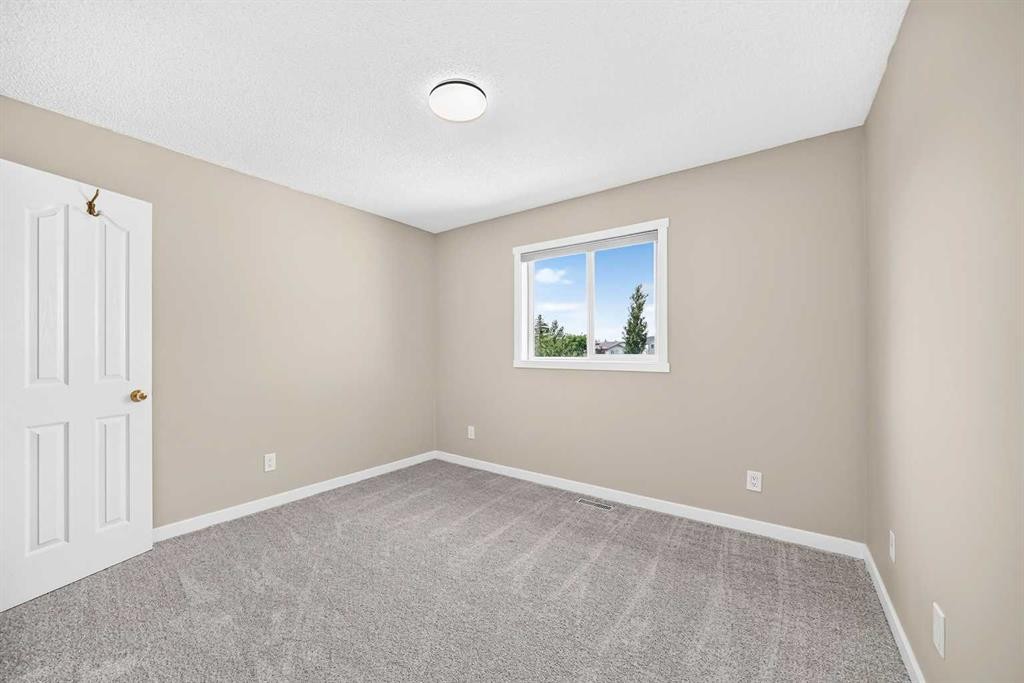 151 Applestone Park Se, Calgary, AB - Indoor Photo Showing Other Room