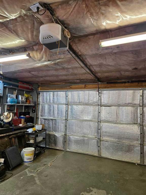 21 Pan Am Street, Swan Hills, AB - Indoor Photo Showing Garage