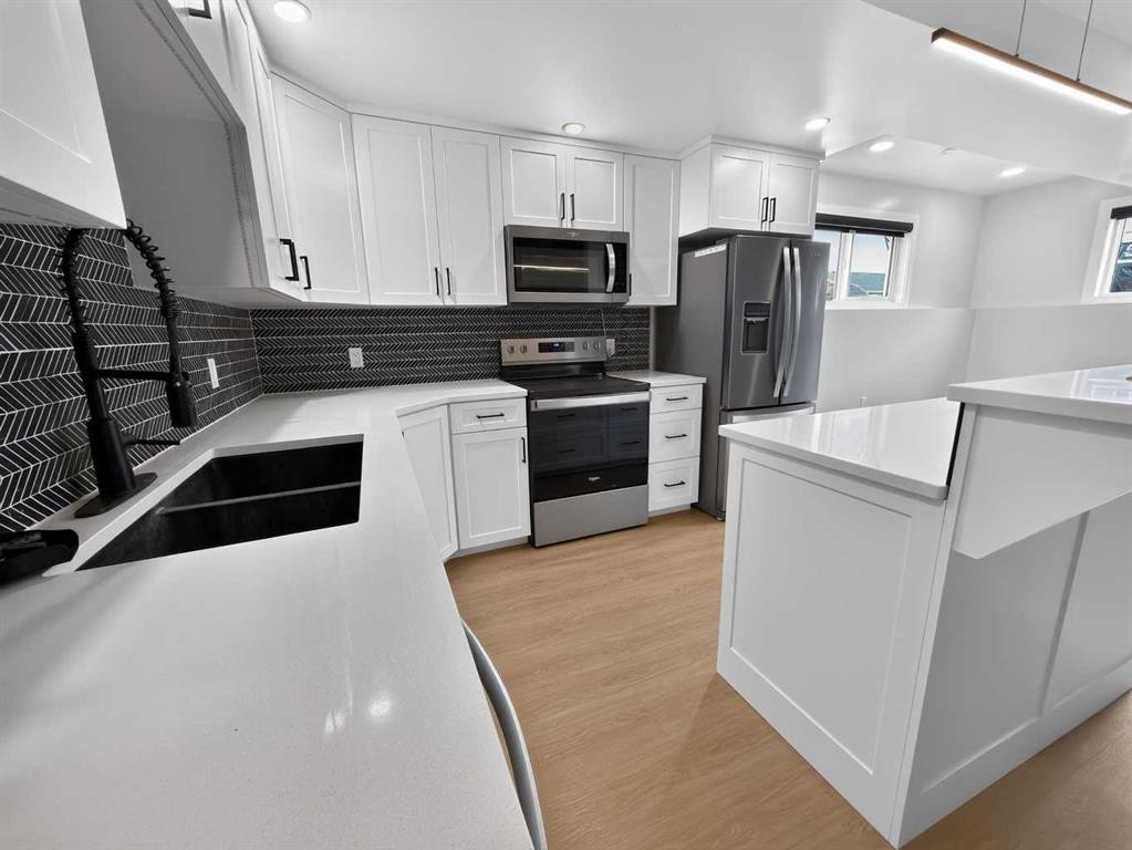 1, 2-10225 105 Ave, La Crete, AB - Indoor Photo Showing Kitchen With Double Sink