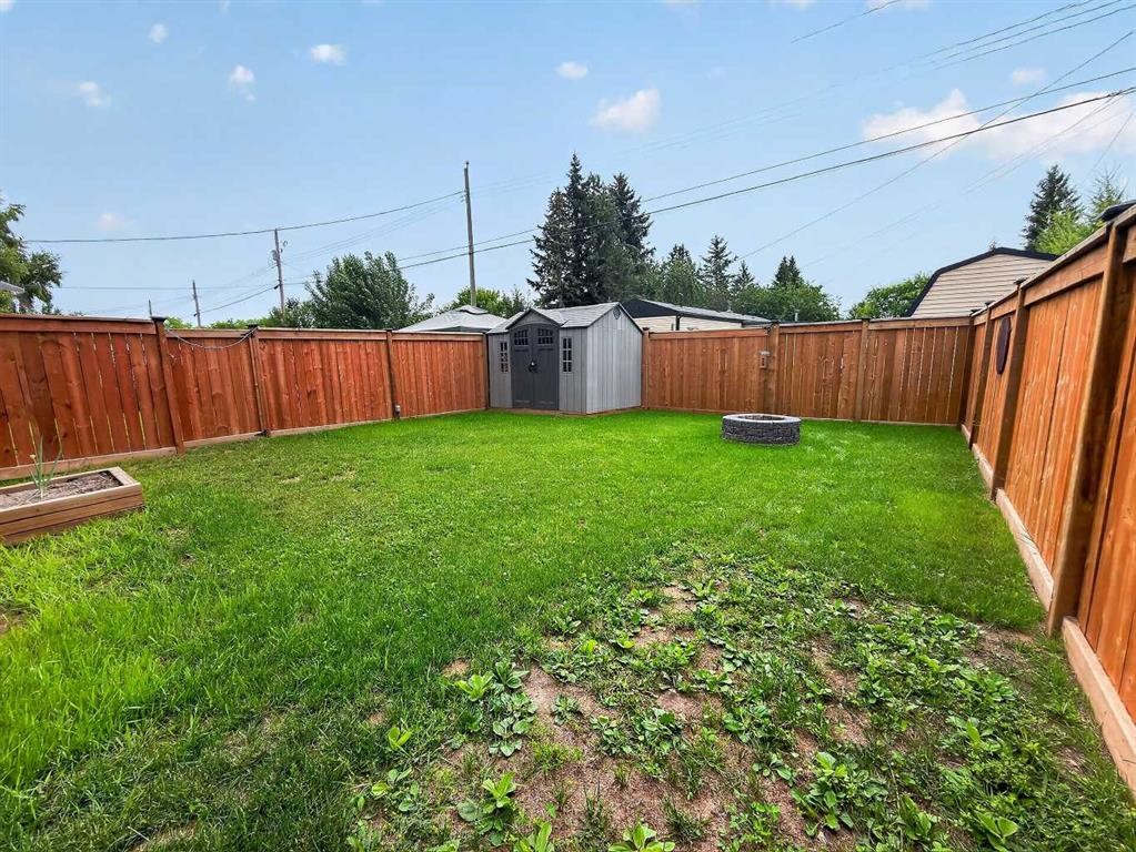 1, 2-10225 105 Ave, La Crete, AB - Outdoor With Backyard