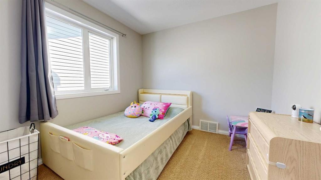 9305 91 Street, Grande Prairie, AB - Indoor Photo Showing Bedroom