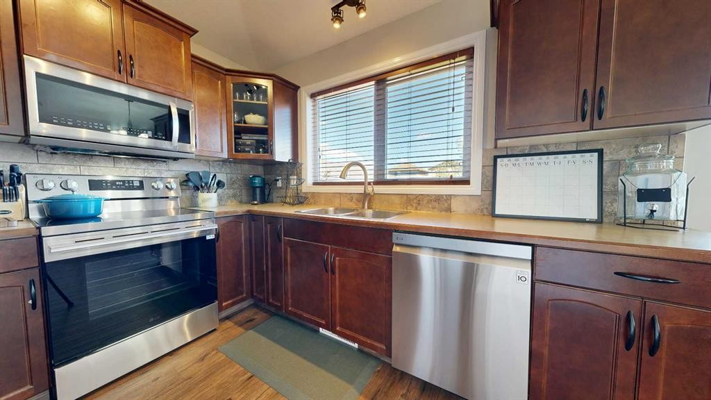 9305 91 Street, Grande Prairie, AB - Indoor Photo Showing Kitchen With Double Sink