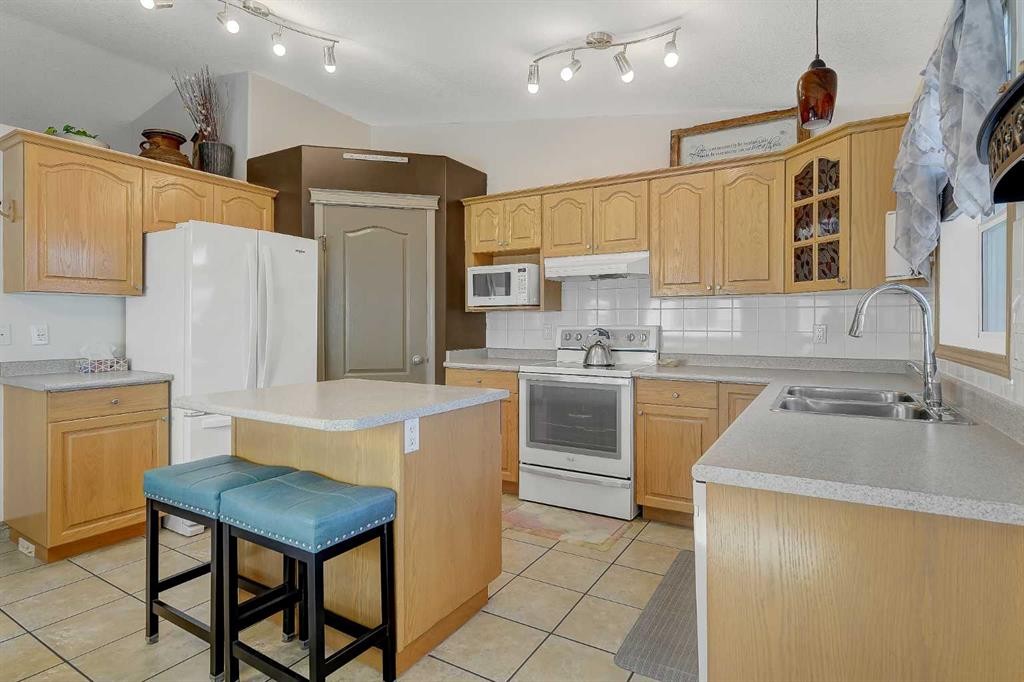 7317 104 Street, Grande Prairie, AB - Indoor Photo Showing Kitchen With Double Sink