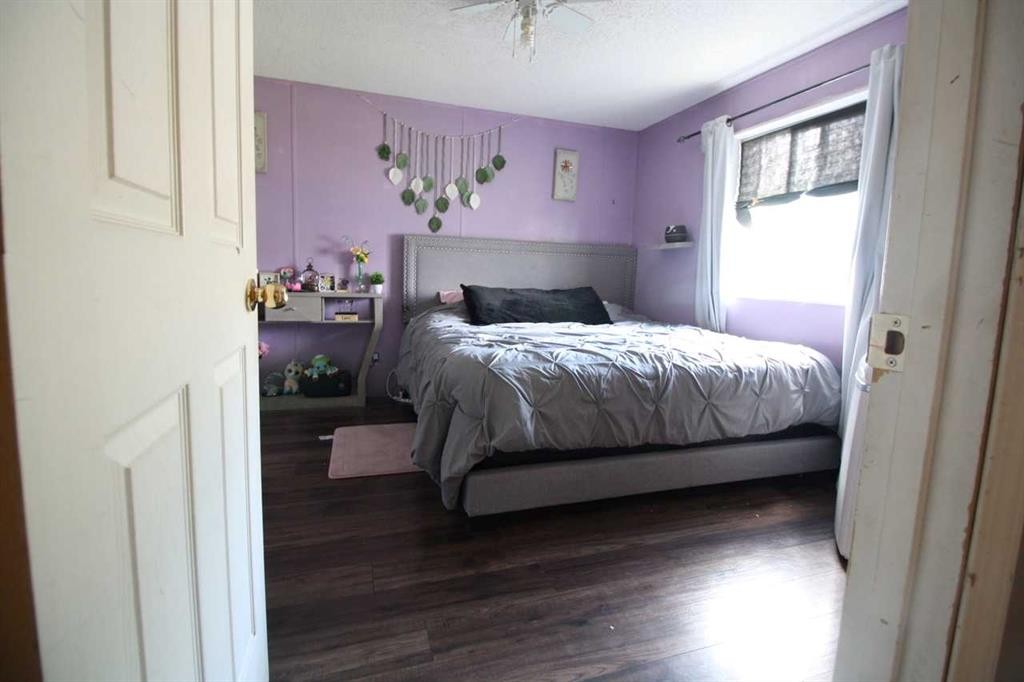 9 Deerridge Drive, High Level, AB - Indoor Photo Showing Bedroom