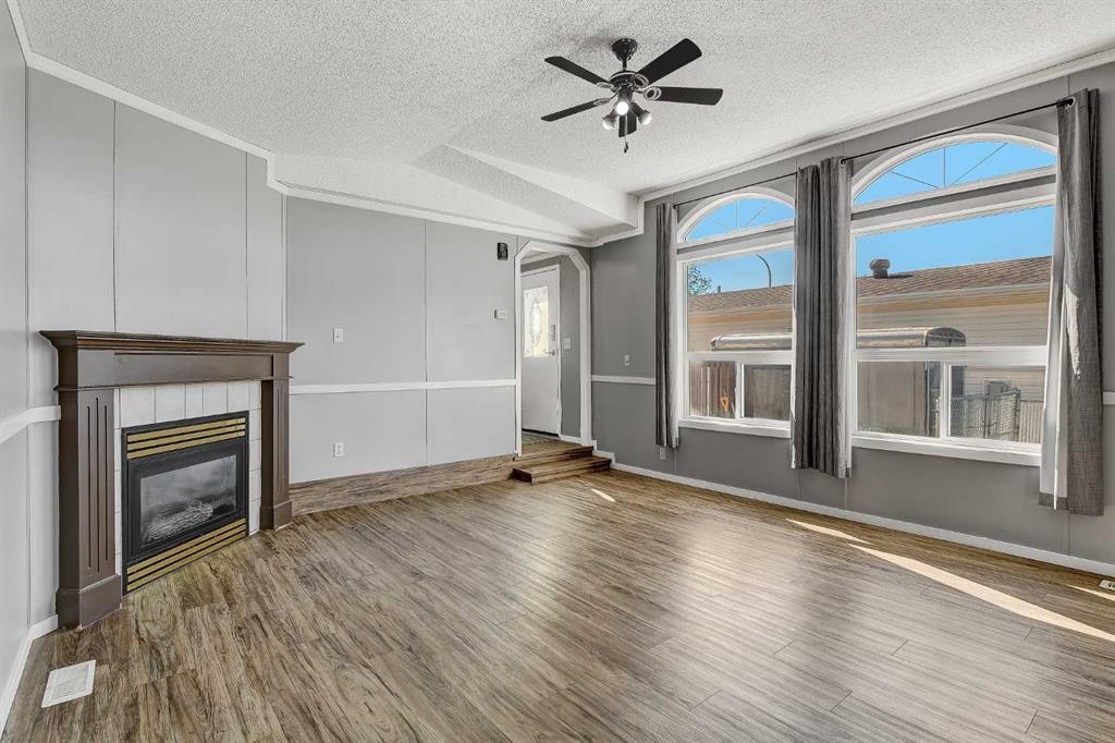 12128 98 Street, Grande Prairie, AB - Indoor Photo Showing Living Room With Fireplace