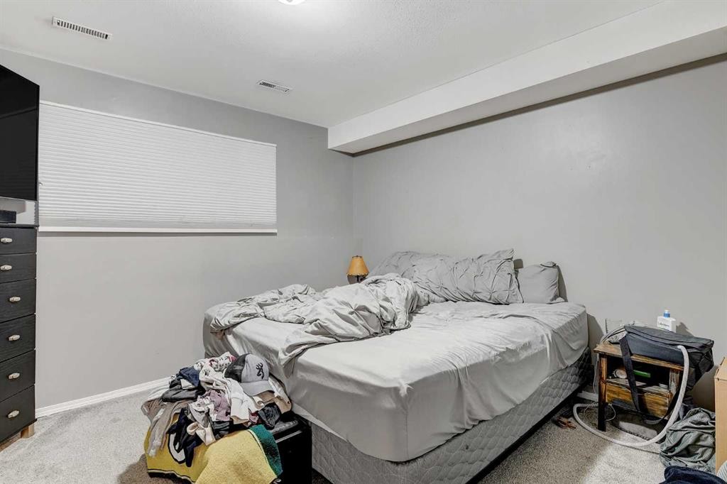 7209 105 Street, Grande Prairie, AB - Indoor Photo Showing Bedroom