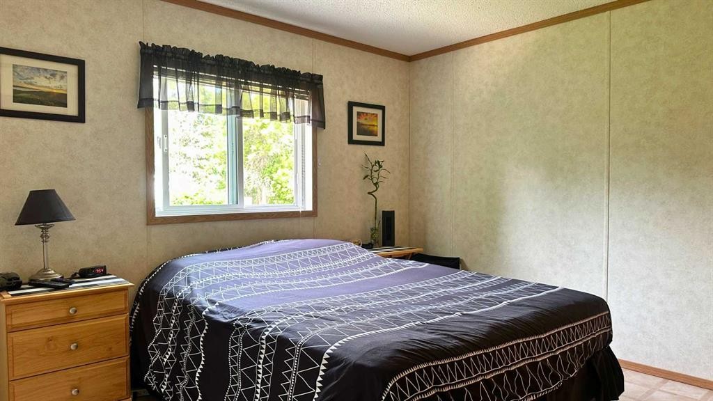 783026 2 Highway, Rycroft, AB - Indoor Photo Showing Bedroom