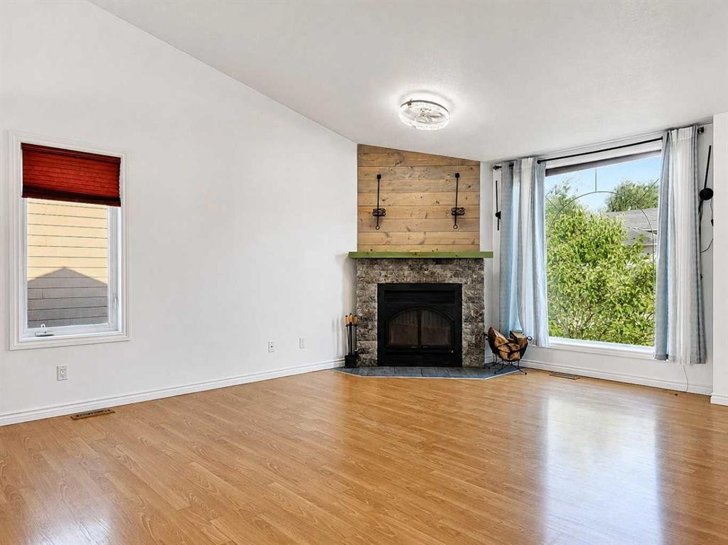 10913 Grande Avenue, Grande Cache, AB - Indoor Photo Showing Living Room With Fireplace