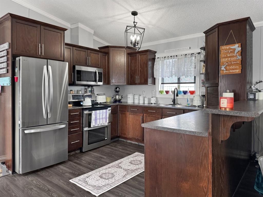 248 Mawdsley Crescent, Grande Cache, AB - Indoor Photo Showing Kitchen With Stainless Steel Kitchen With Double Sink