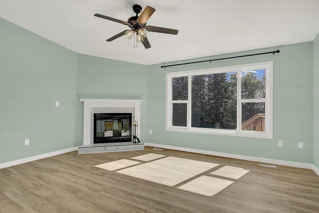 723020 Range Road 95, Beaverlodge, AB - Indoor Photo Showing Living Room With Fireplace