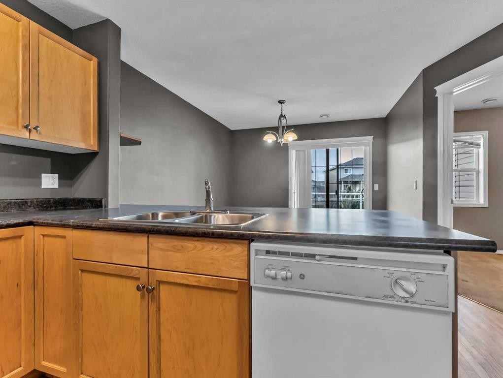 29 Northlands Lane Ne, Medicine Hat, AB - Indoor Photo Showing Kitchen With Double Sink