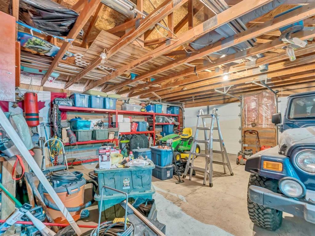 6-12006 Range Road 43, Rural Cypress County, AB - Indoor Photo Showing Garage
