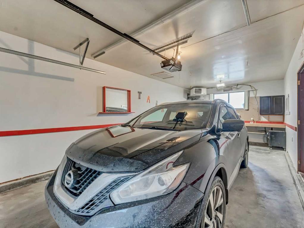 2210 Upland Drive Se, Medicine Hat, AB - Indoor Photo Showing Garage