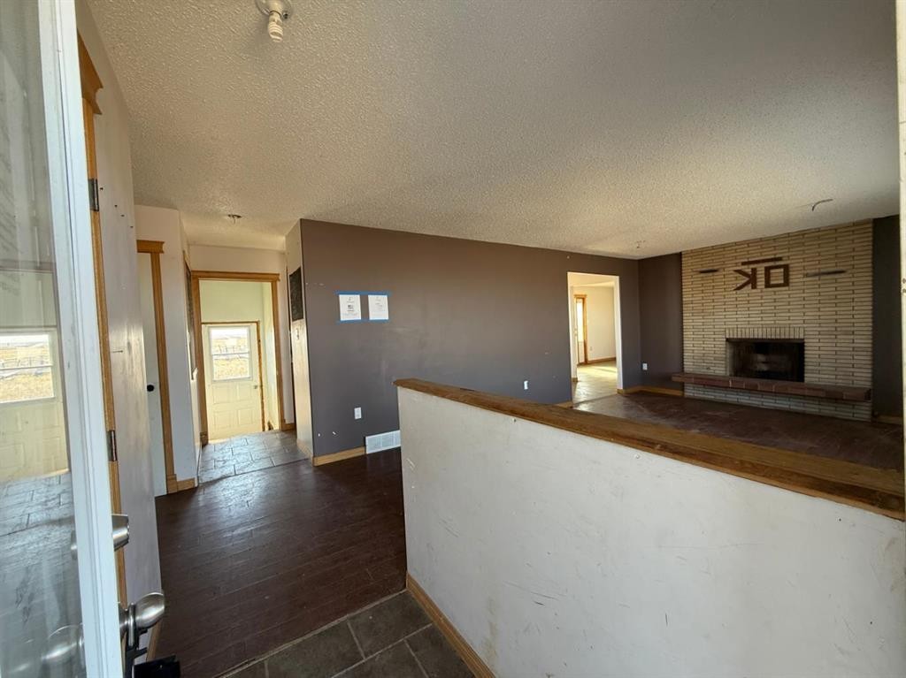 14515 Range Road 93, Rural Cypress County, AB - Indoor With Fireplace