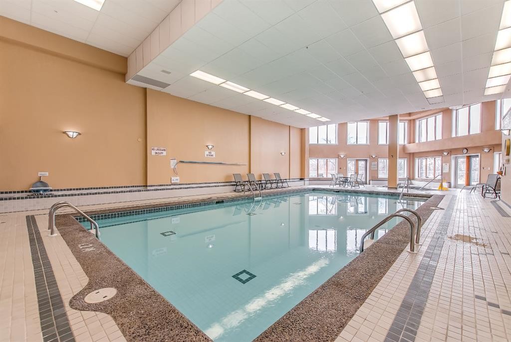 429-1182 Southview Drive Se, Medicine Hat, AB - Indoor Photo Showing Other Room With In Ground Pool