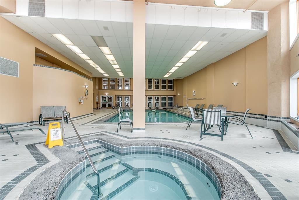 429-1182 Southview Drive Se, Medicine Hat, AB - Indoor Photo Showing Other Room With In Ground Pool