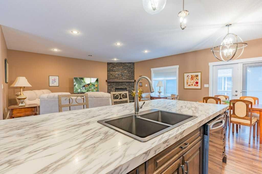 208 Westview Crescent West, Bow Island, AB - Indoor With Fireplace