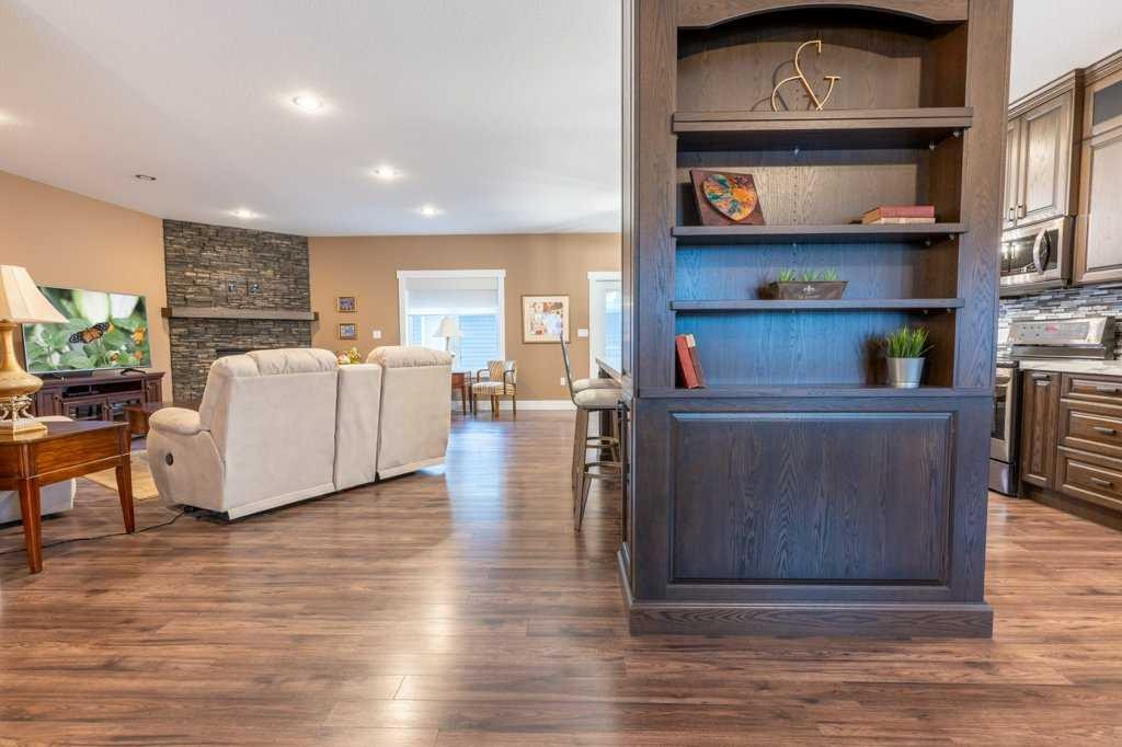 208 Westview Crescent West, Bow Island, AB - Indoor With Fireplace