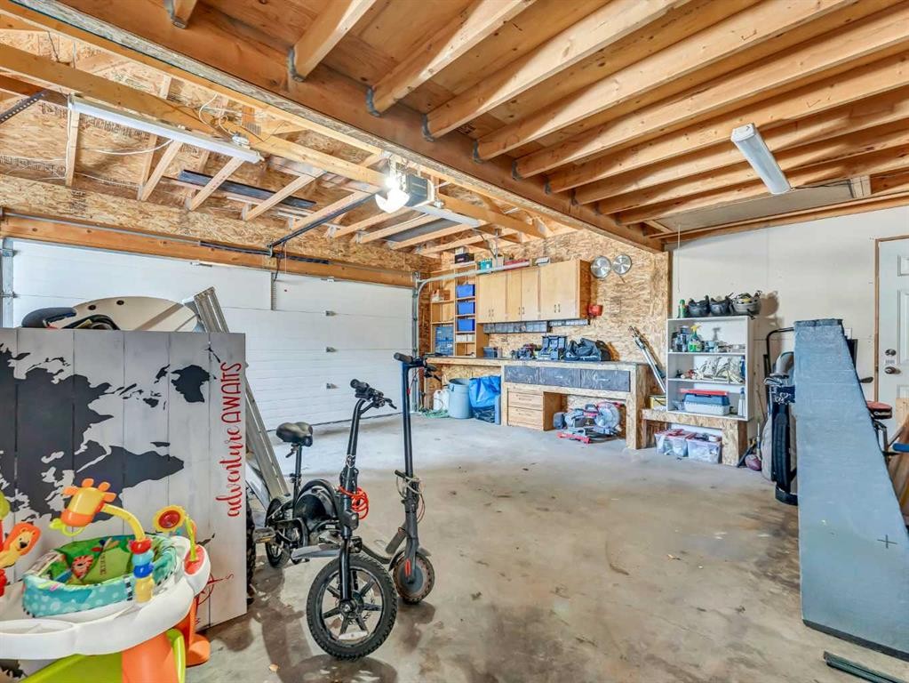 416 Redcliff Way Se, Redcliff, AB - Indoor Photo Showing Garage