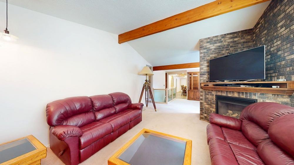 209 2 Avenue, Burdett, AB - Indoor Photo Showing Living Room With Fireplace