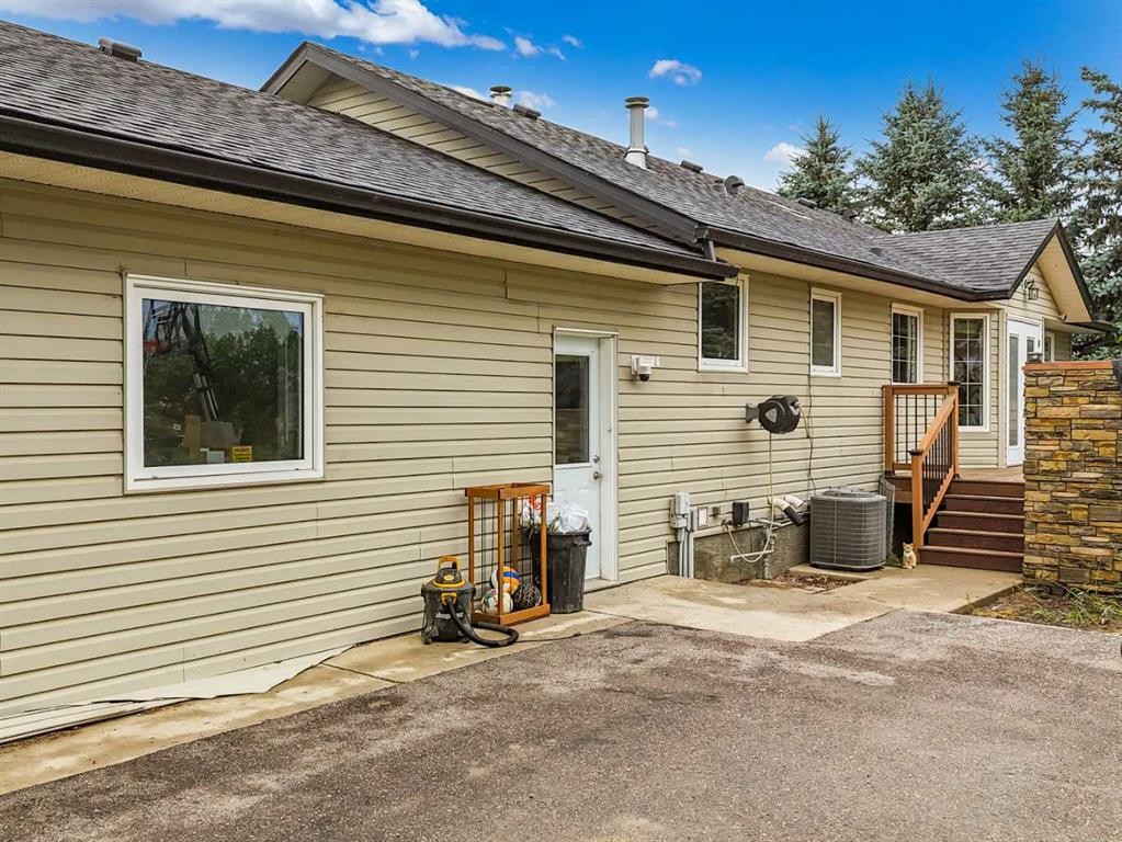 104063 Range Road 111, Bow Island, AB - Outdoor With Deck Patio Veranda With Exterior