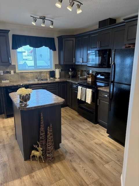 8 Anderson Close, Whitecourt, AB - Indoor Photo Showing Kitchen With Double Sink
