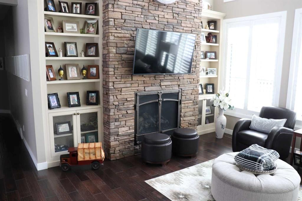 6663 15 Avenue, Edson, AB - Indoor Photo Showing Living Room With Fireplace