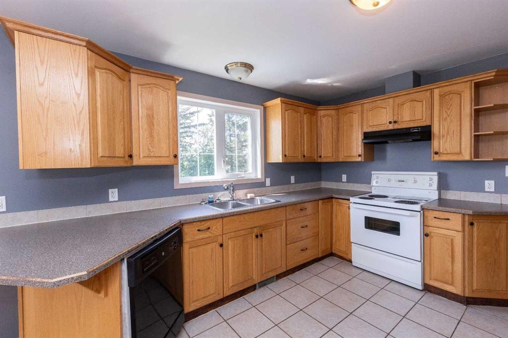 2584 Auger Road, Wabasca, AB - Indoor Photo Showing Kitchen With Double Sink
