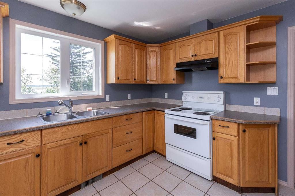 2584 Auger Road, Wabasca, AB - Indoor Photo Showing Kitchen With Double Sink