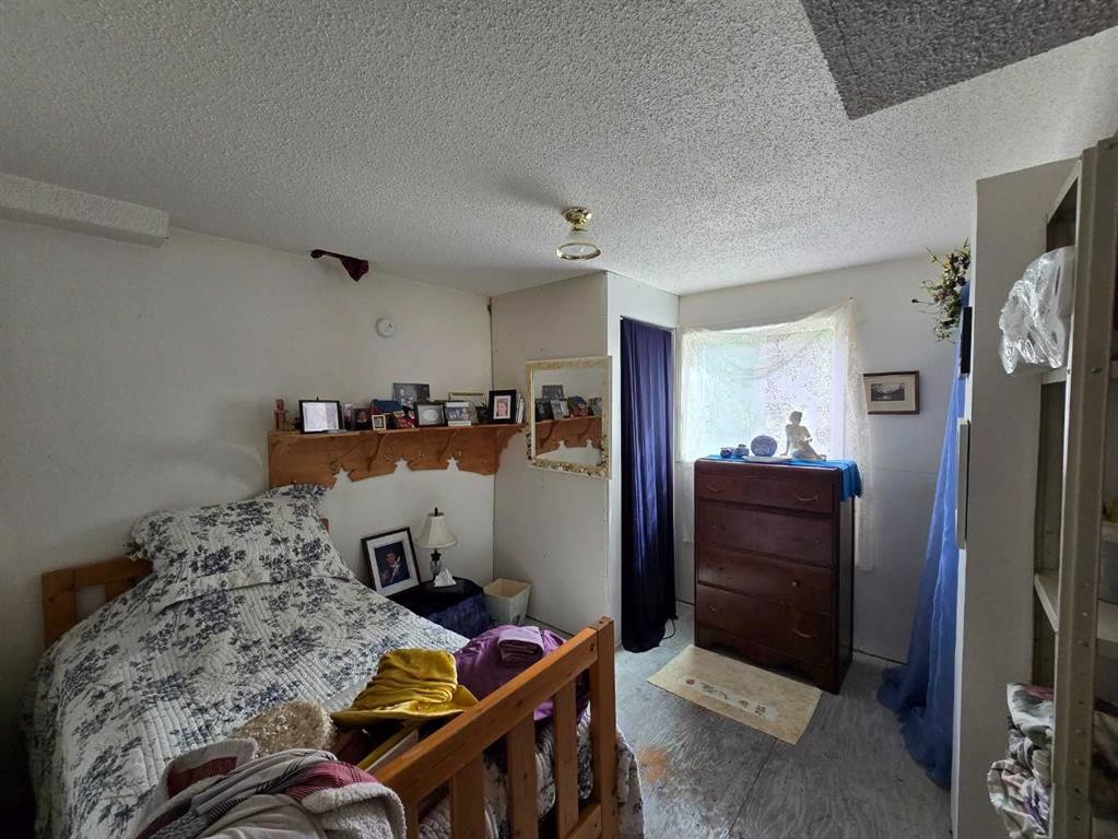 109 Main Street,-57115 Range Road 80, Rochfort Bridge, AB - Indoor Photo Showing Bedroom