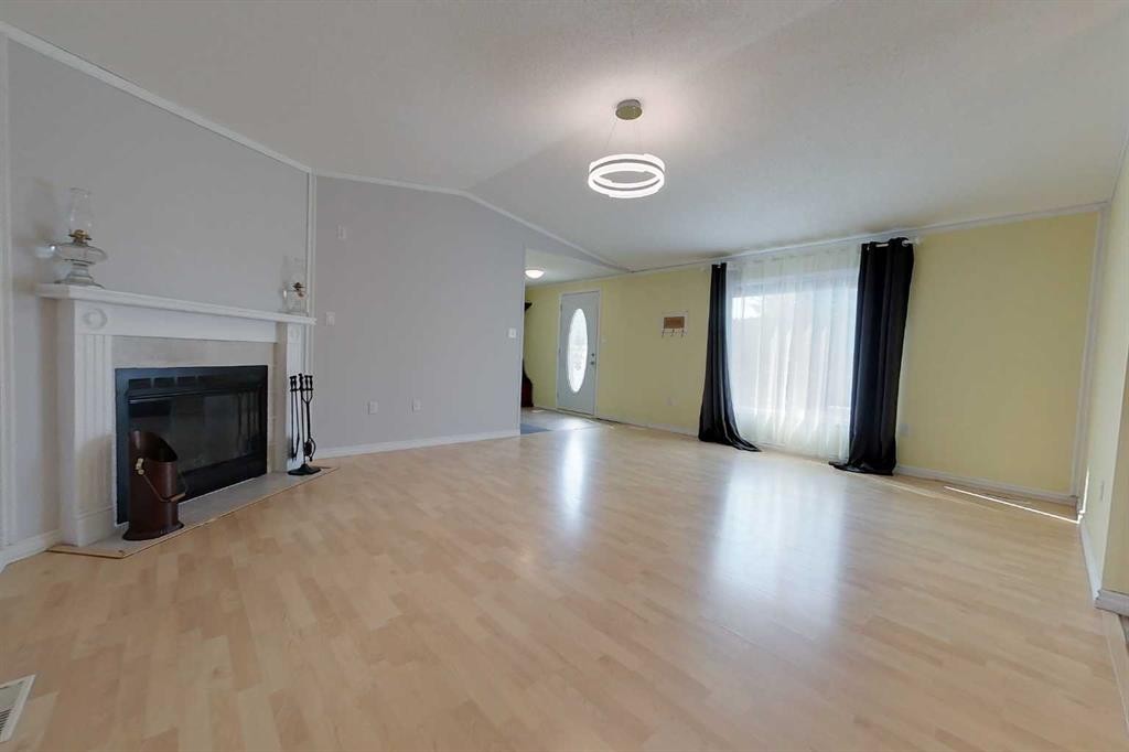 2692 Bambi St, Wabasca, AB - Indoor Photo Showing Living Room With Fireplace