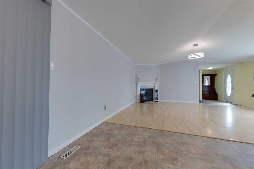 2692 Bambi St, Wabasca, AB - Indoor Photo Showing Other Room With Fireplace