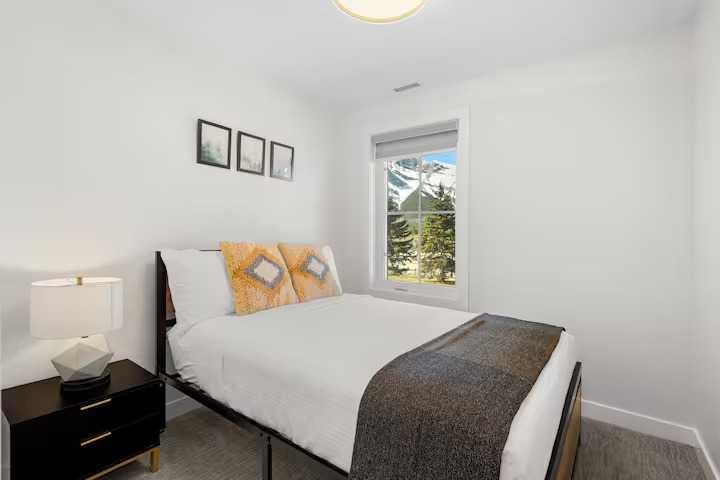 3-1717B Mountain Avenue, Canmore, AB - Indoor Photo Showing Bedroom