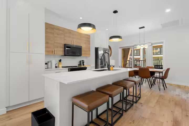 3-1717B Mountain Avenue, Canmore, AB - Indoor Photo Showing Kitchen With Upgraded Kitchen