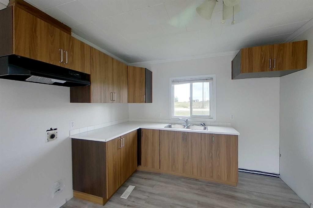 2571 Auger Road, Wabasca, AB - Indoor Photo Showing Kitchen With Double Sink